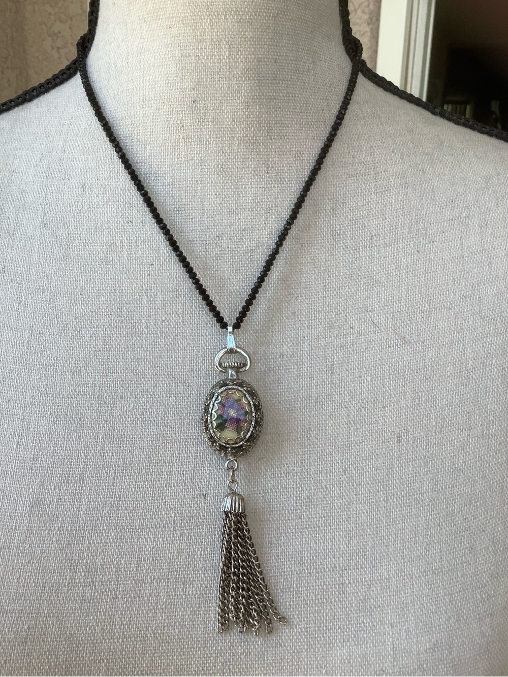 Black beaded silver tone necklace &  iridescent pendant